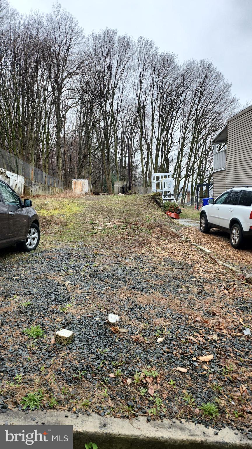 634 South 16 1/2 Street Reading, PA 19606 - Photo 4 of 4 a view of yard with a car parked