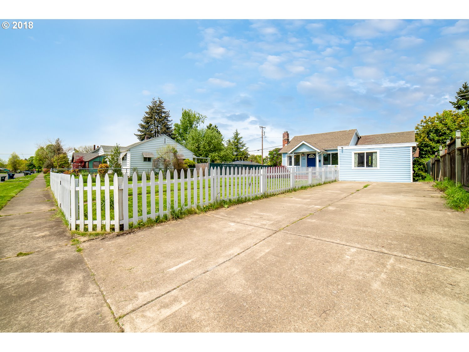 1286 D Street Springfield, OR 97477 - Photo 3 of 32 a view of a house with a backyard