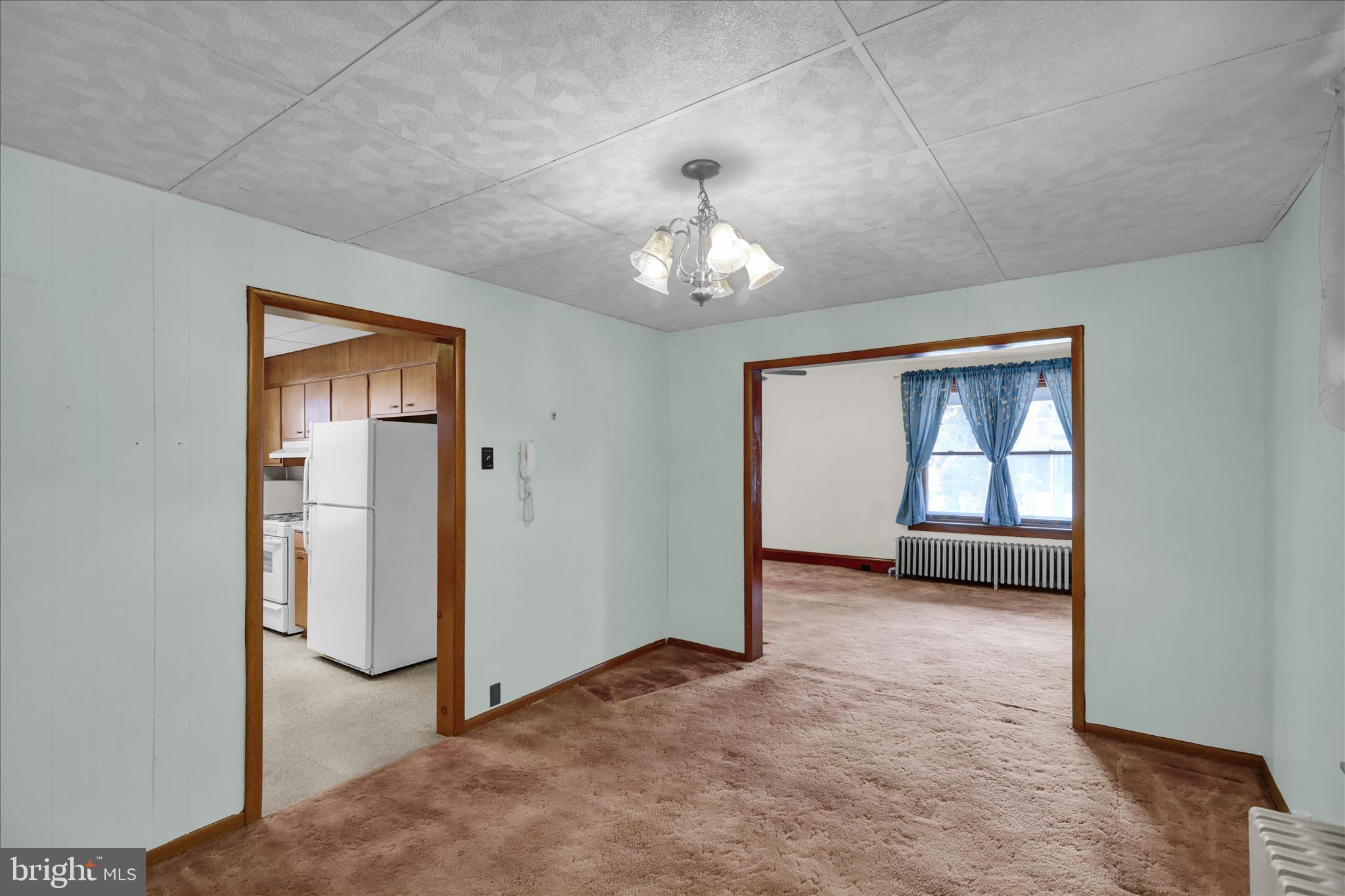 4205 Penn Avenue Reading, PA 19608 - Photo 16 of 54 an empty room with chandelier fan and windows