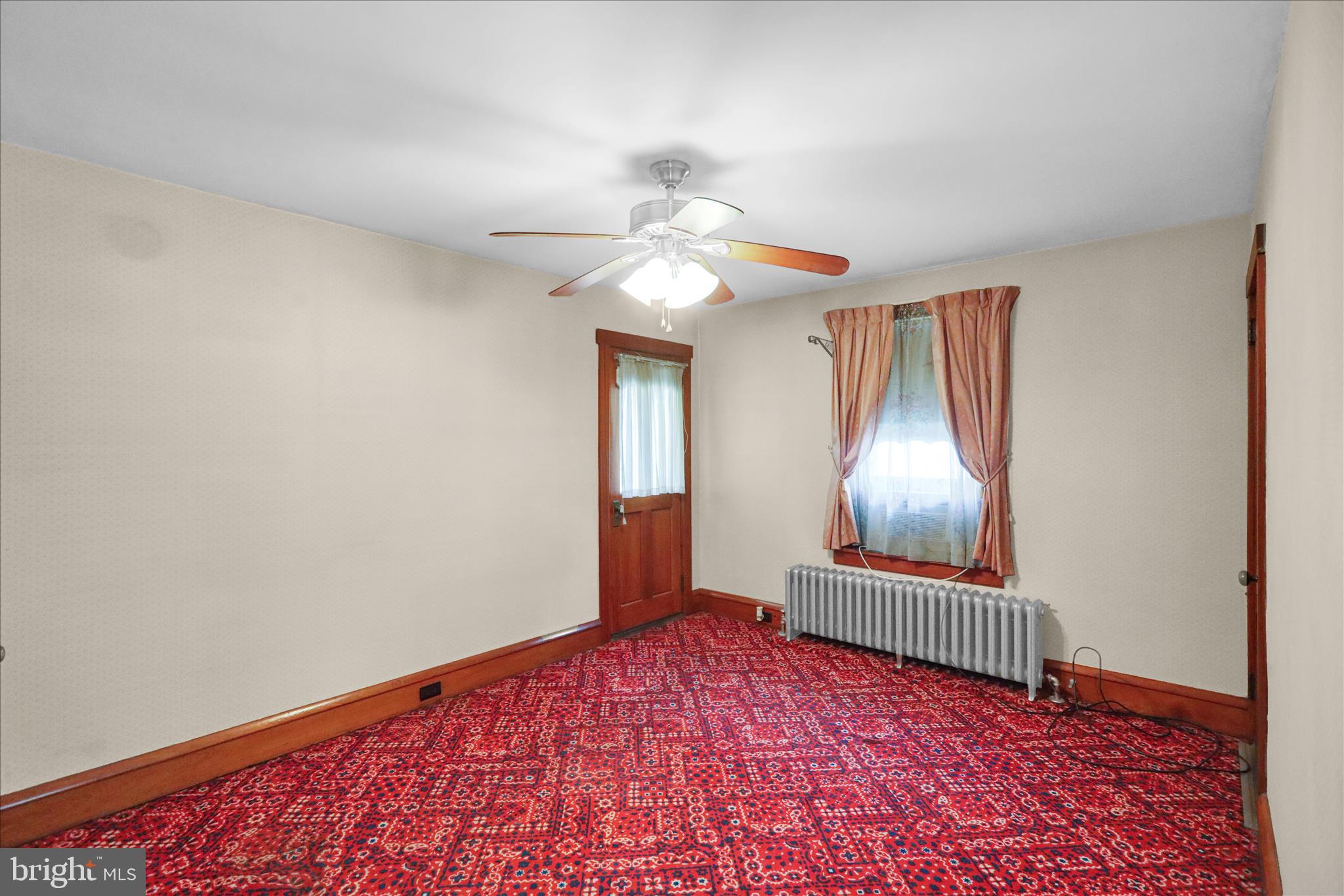 4205 Penn Avenue Reading, PA 19608 - Photo 28 of 54 a very nice looking room with a ceiling fan and wooden floor