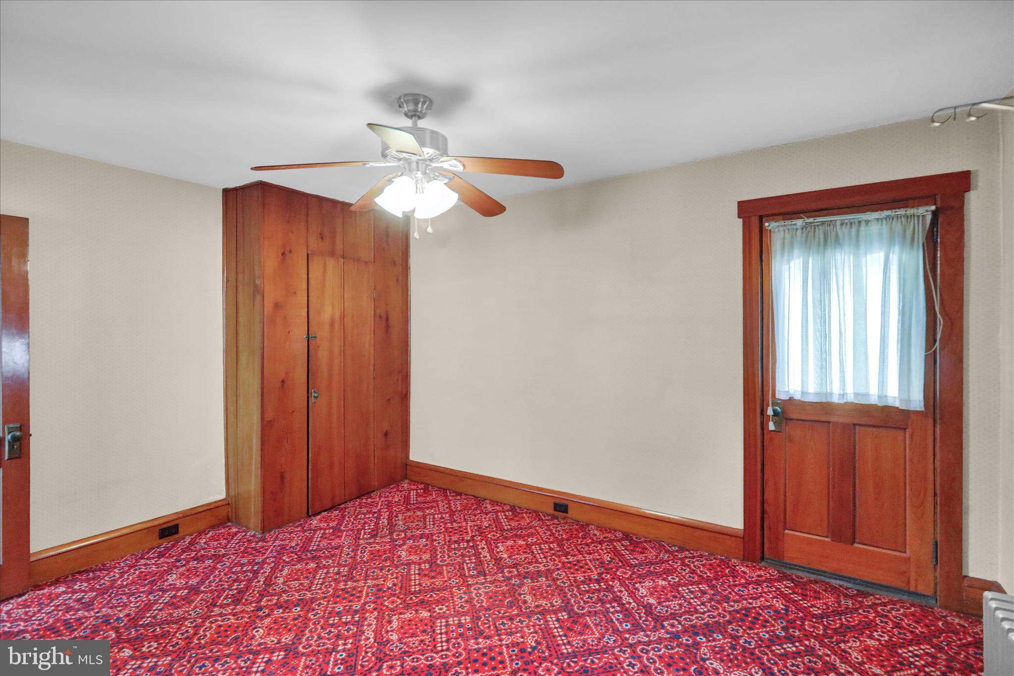 4205 Penn Avenue Reading, PA 19608 - Photo 29 of 54 an empty room with windows and fan