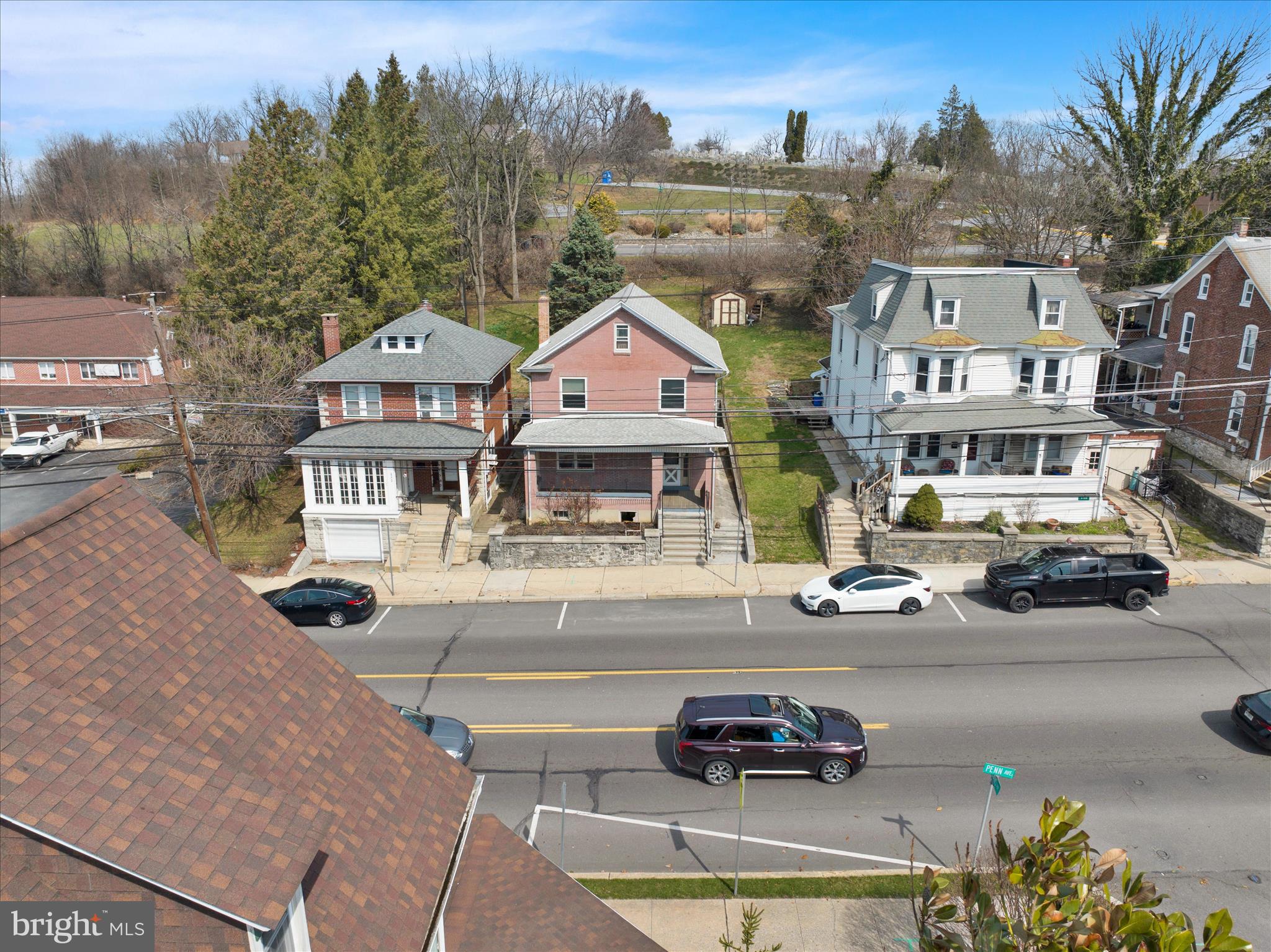 4205 Penn Avenue Reading, PA 19608 - Photo 9 of 54 an aerial view of a house with swimming pool and garden view