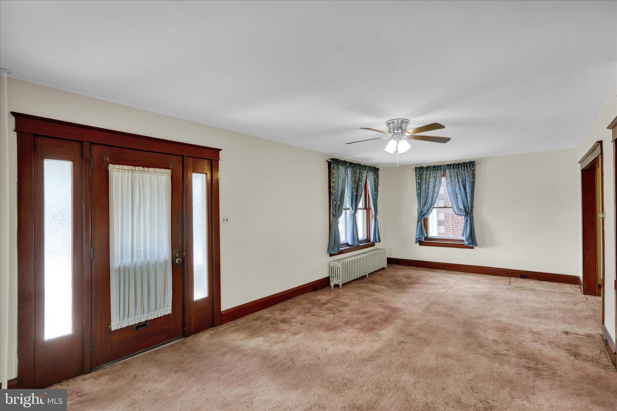 4205 Penn Avenue Reading, PA 19608 - Photo 10 of 54 a view of an empty room with window and bathroom