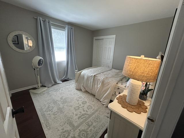 9191 Red Road Kempton, PA 19529 - Photo 19 of 25 Rich hardwood flooring anchors this cozy bedroom under a smooth ceiling.