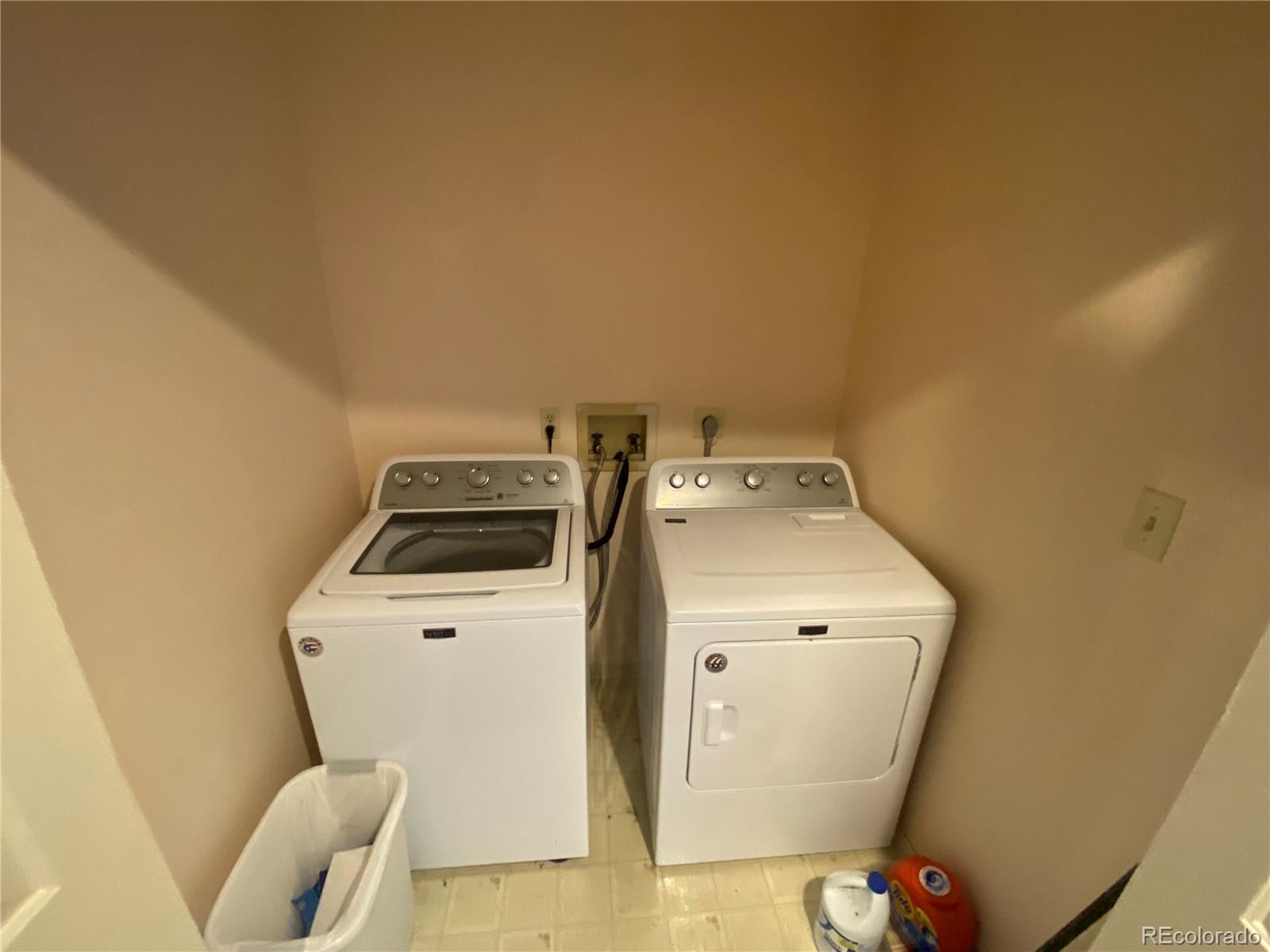 7079 Estes Drive Arvada, CO 80004 - Photo 30 of 50 a utility room with dryer and washer