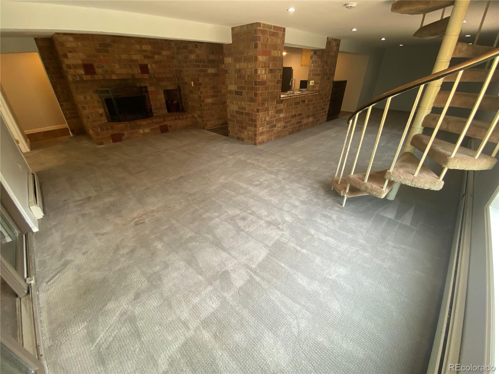 7079 Estes Drive Arvada, CO 80004 - Photo 36 of 50 a view of entryway with stairs