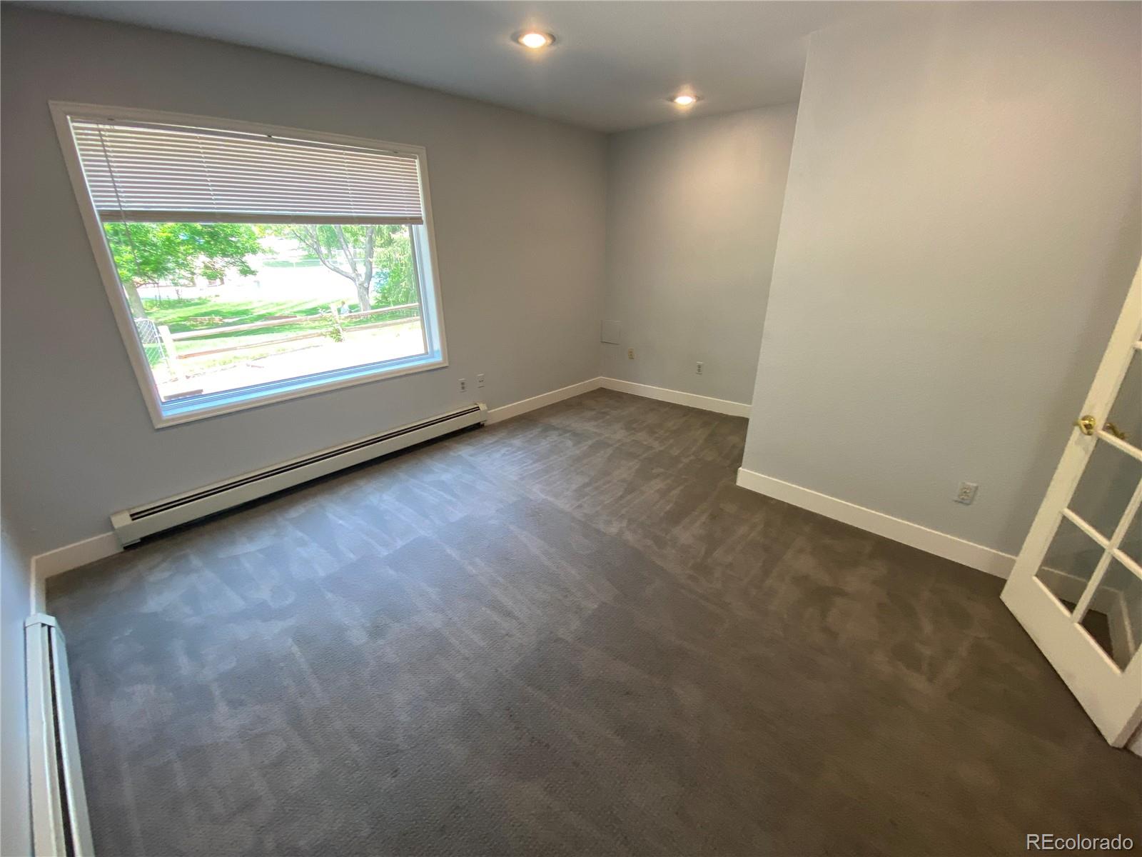 7079 Estes Drive Arvada, CO 80004 - Photo 39 of 50 an empty room with a window