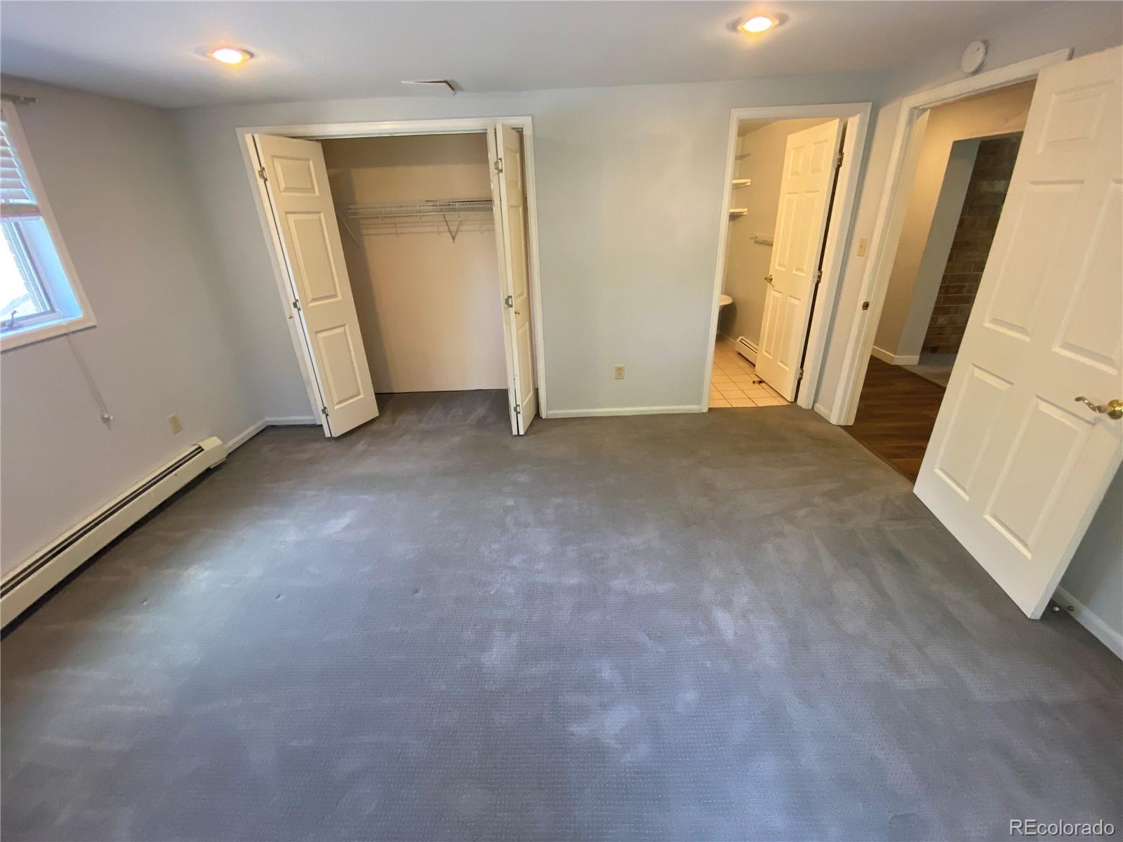 7079 Estes Drive Arvada, CO 80004 - Photo 42 of 50 an empty room with windows