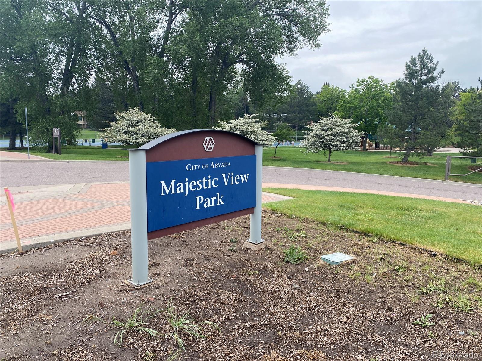 7079 Estes Drive Arvada, CO 80004 - Photo 47 of 50 a view of a street with red trees