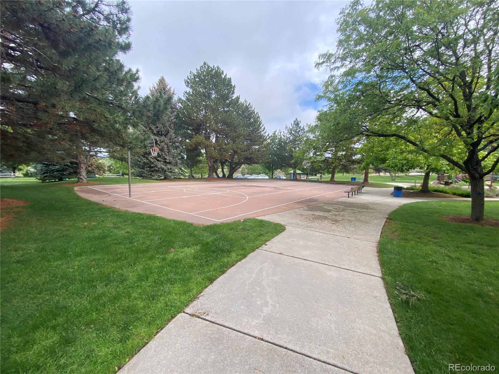 7079 Estes Drive Arvada, CO 80004 - Photo 49 of 50 a view of a park with large trees