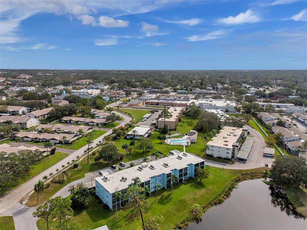 1430 Heather Ridge Boulevard, Unit 304 Dunedin, FL 34698 - Photo 35 of 36 an aerial view of a house with a garden