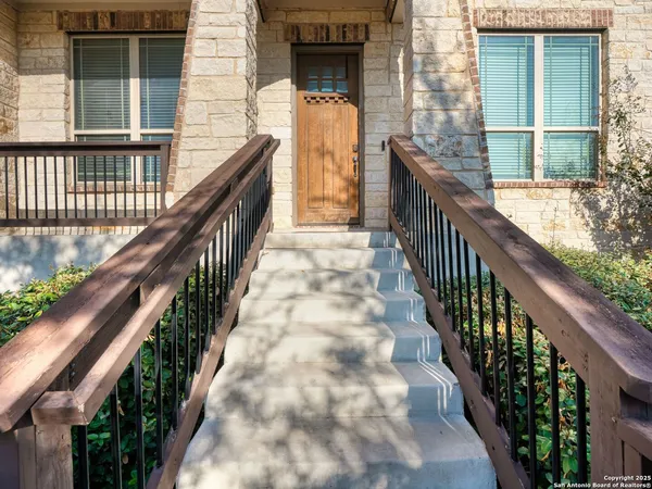 a view of balcony with wooden floor