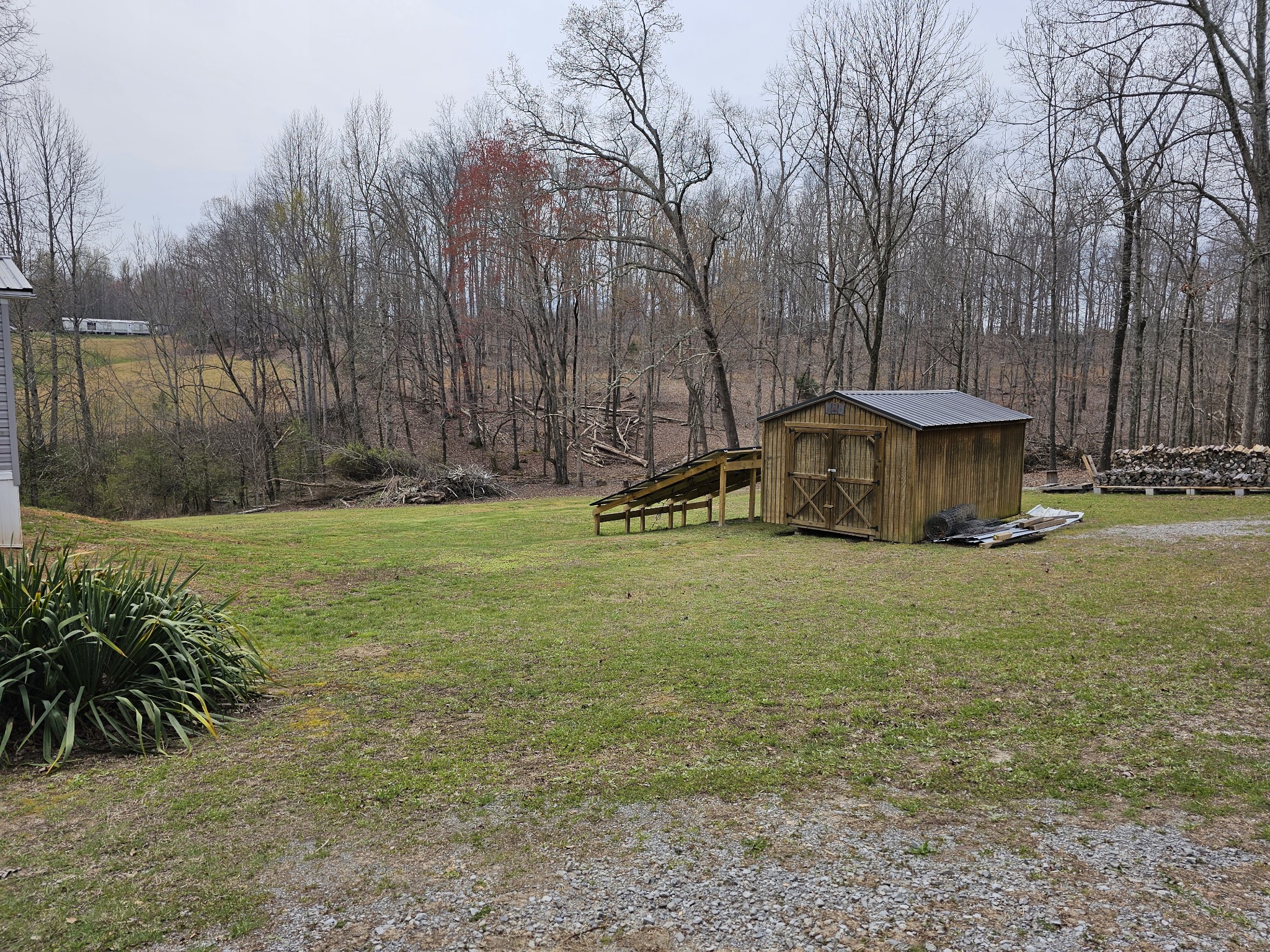 41 Sweet Springs Road Kelso, TN 37348 - Photo 28 of 38 a view of a house with backyard and trees
