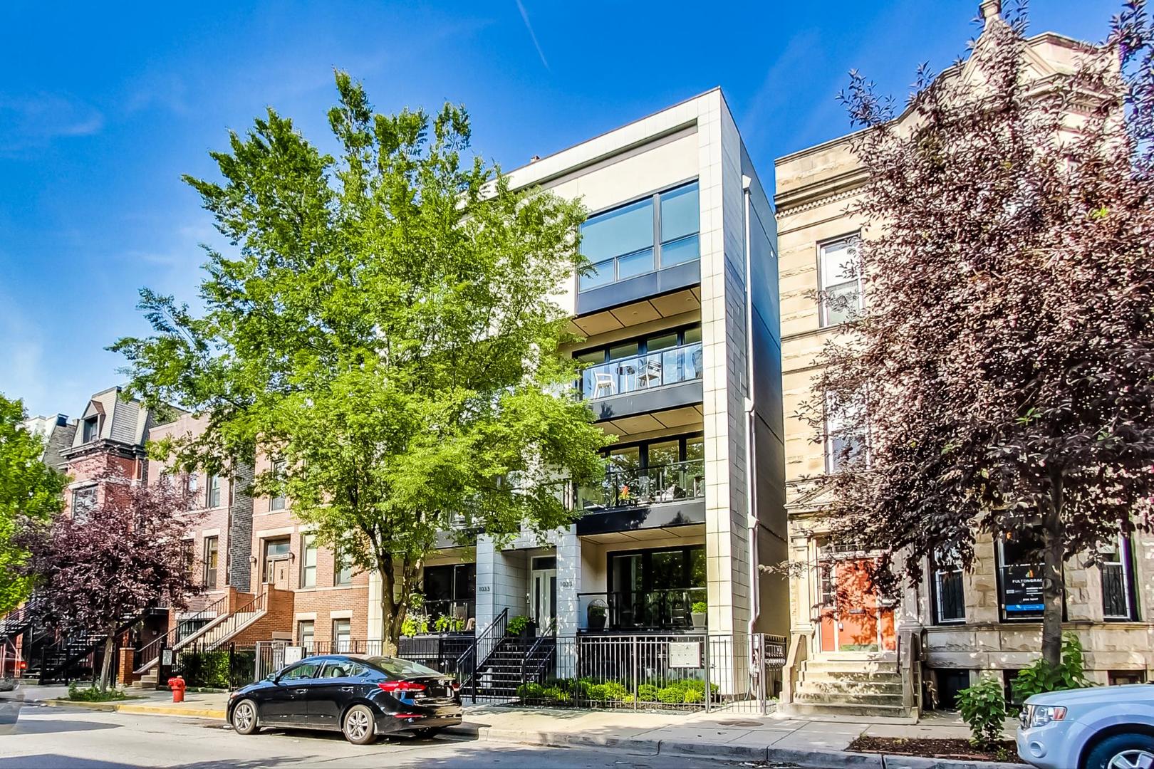 a building with trees in front of it