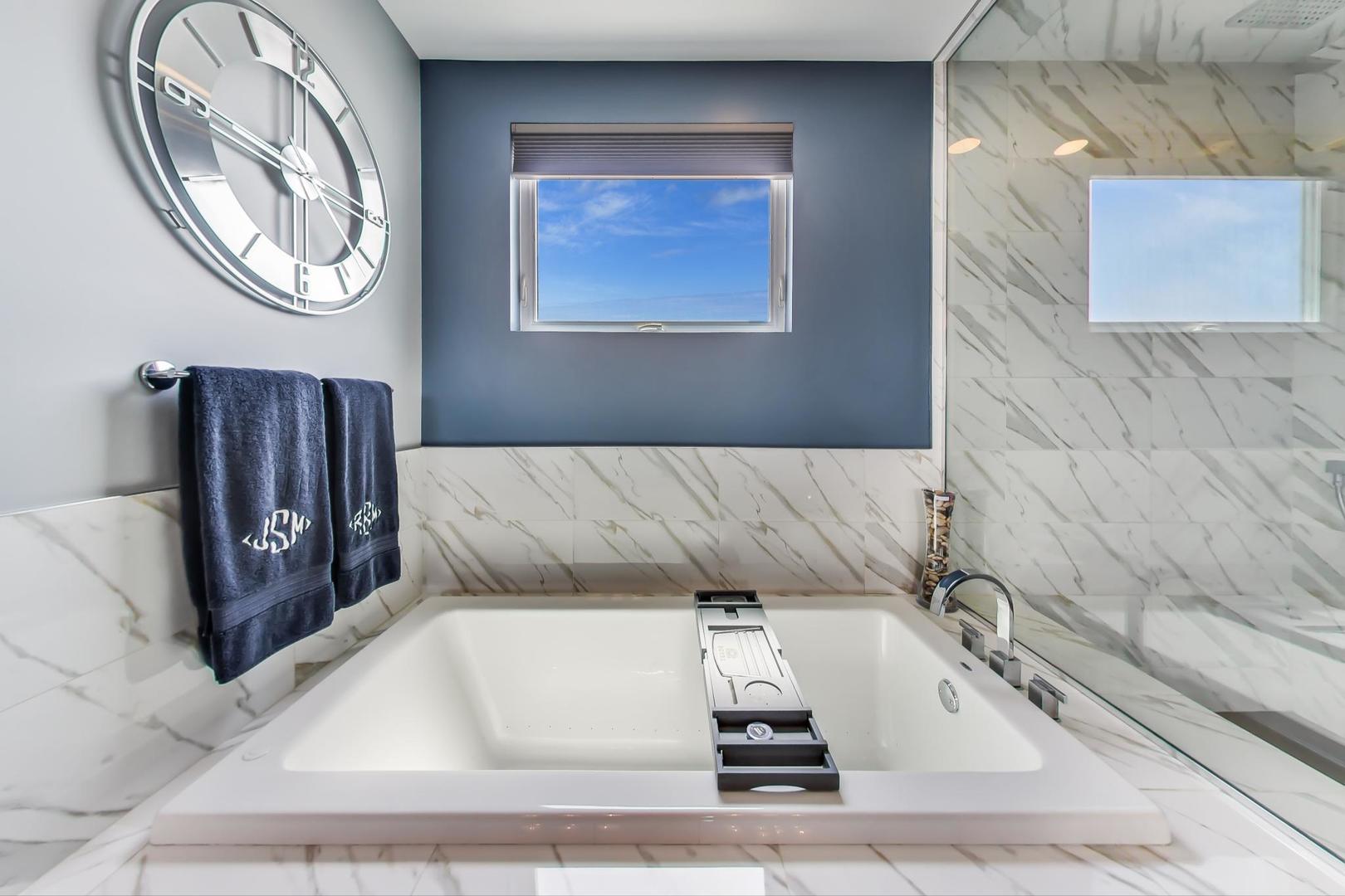 1033 South Racine Avenue, Unit 3SR Chicago, IL 60607 - Photo 29 of 49 a white bath tub sitting in a bathroom