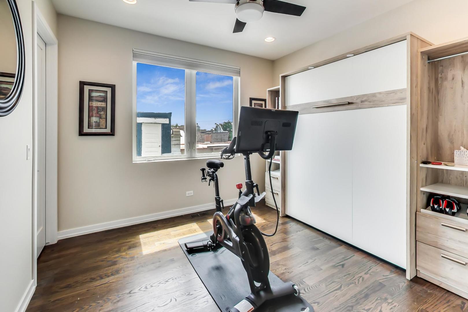 1033 South Racine Avenue, Unit 3SR Chicago, IL 60607 - Photo 31 of 49 a view of a room with gym equipment