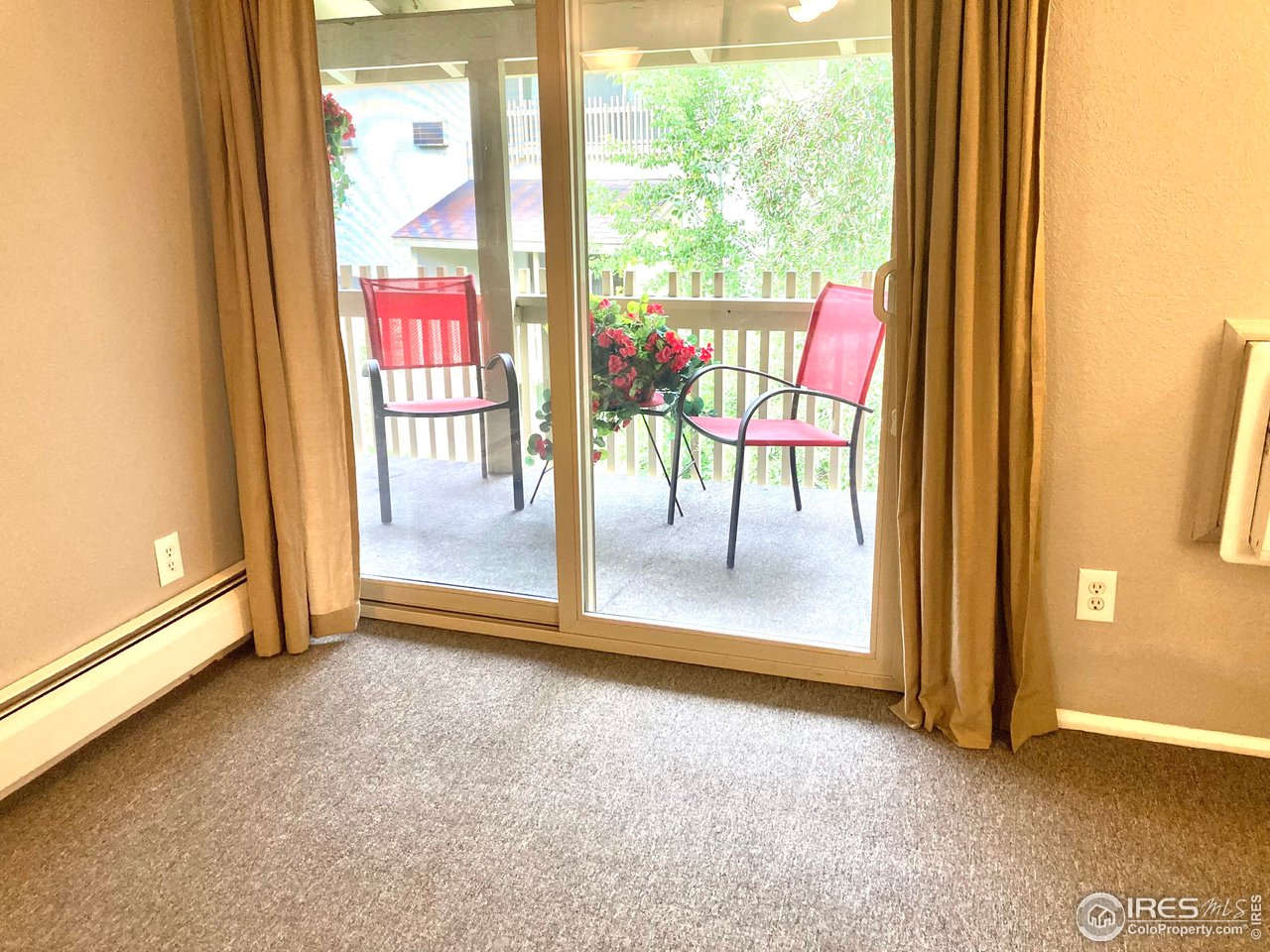 2707 Valmont Road, Unit 303C Boulder, CO 80304 - Photo 6 of 20 Patio Doors (3 sets of doors in the condo) leading to large deck with mountain views