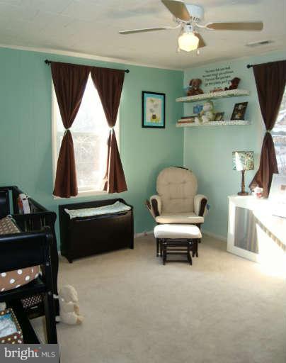 5504 Tramore Road Baltimore, MD 21214 - Photo 14 of 29 a living room with furniture and a window