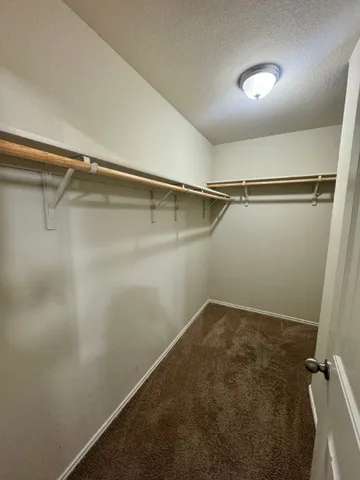 a view of a room with racks on the wall