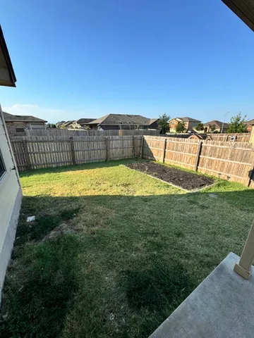 a view of a swimming pool with an ocean view