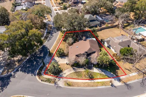 an aerial view of a highlighted house