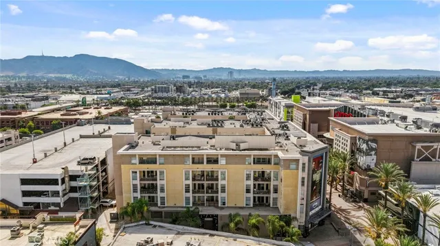 a view of a city with tall buildings