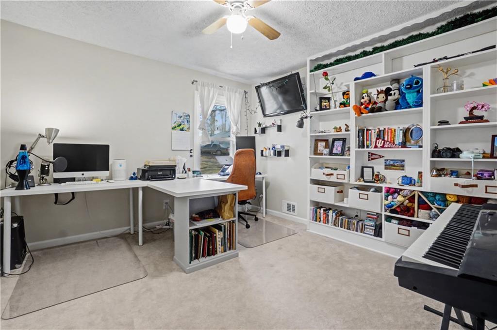 408 Candy Lane Canton, GA 30115 - Photo 15 of 22 a view of a workspace with furniture