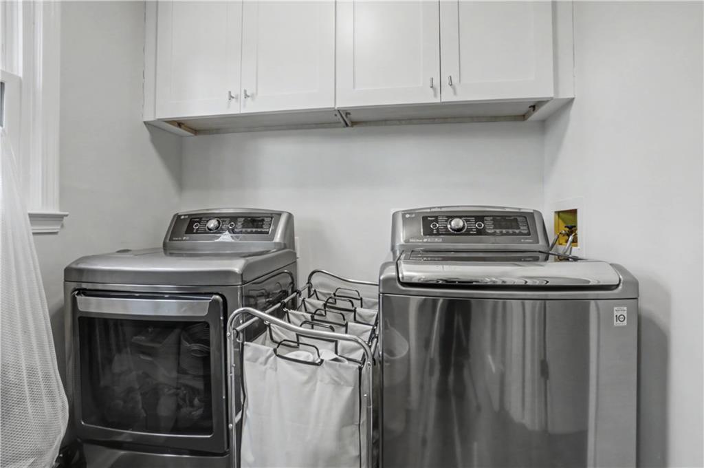 408 Candy Lane Canton, GA 30115 - Photo 18 of 22 a kitchen with a stove and cabinets