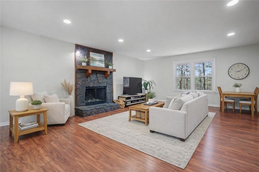 408 Candy Lane Canton, GA 30115 - Photo 4 of 22 a living room with furniture and a fireplace