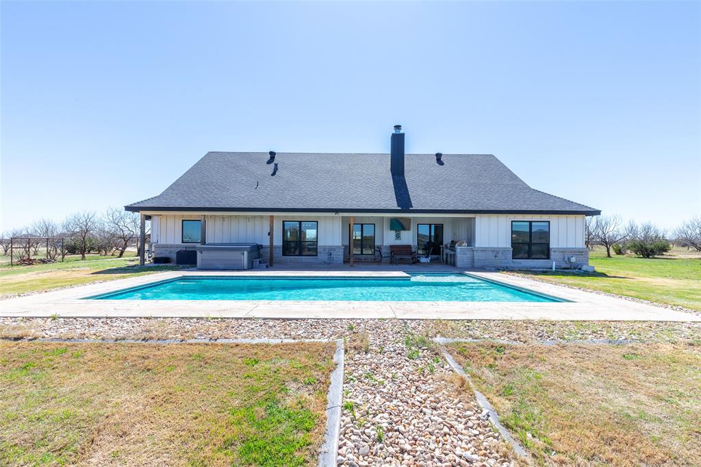 296 Mesquite Ridge Lane Lawn, TX 79530 - Photo 5 of 35 a house with swimming pool in front of it
