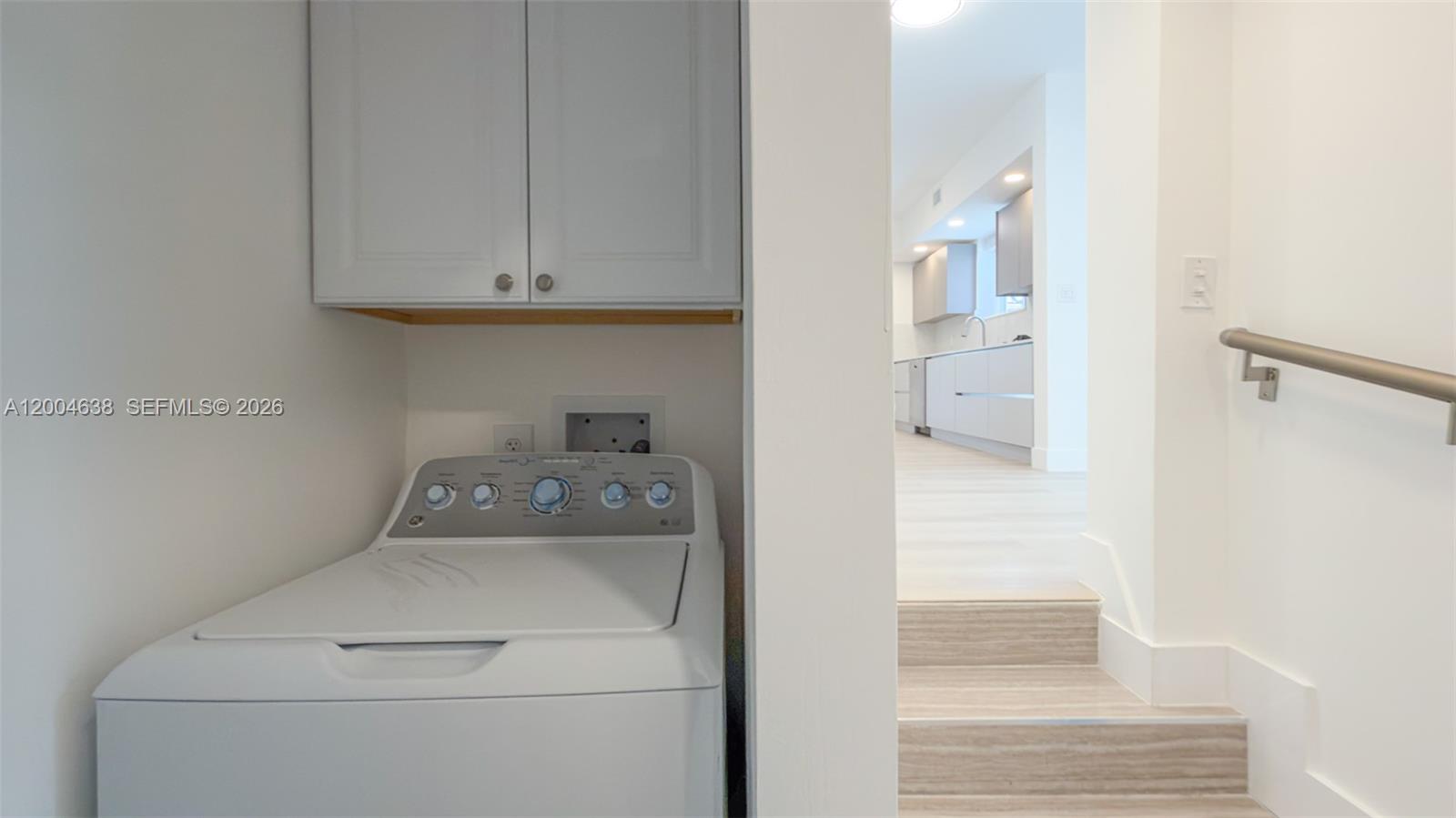1690 Daytonia Road Miami Beach, FL 33141 - Photo 35 of 88 a utility room with dryer and washer