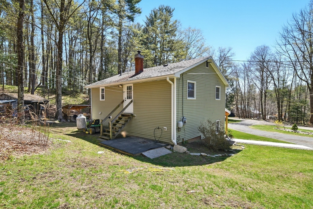 24 Old Main Road Worthington, MA 01098 - Photo 40 of 42 a view of a house with backyard
