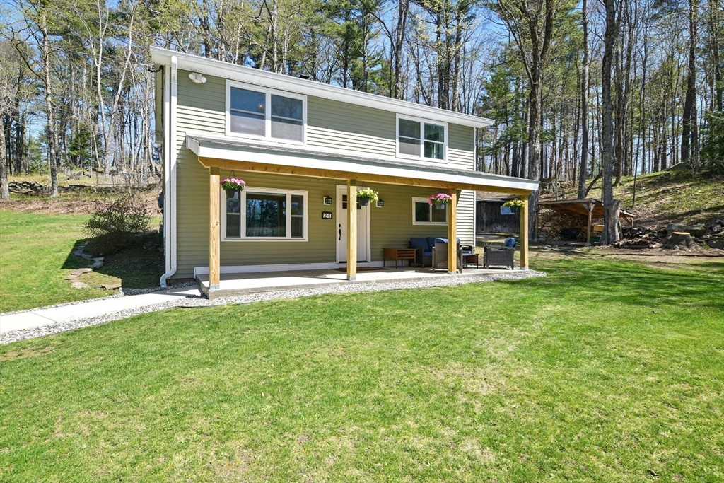 24 Old Main Road Worthington, MA 01098 - Photo 4 of 42 front view of a house with a yard