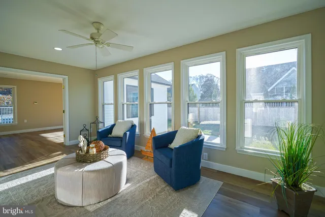 a living room with a fireplace and a fireplace