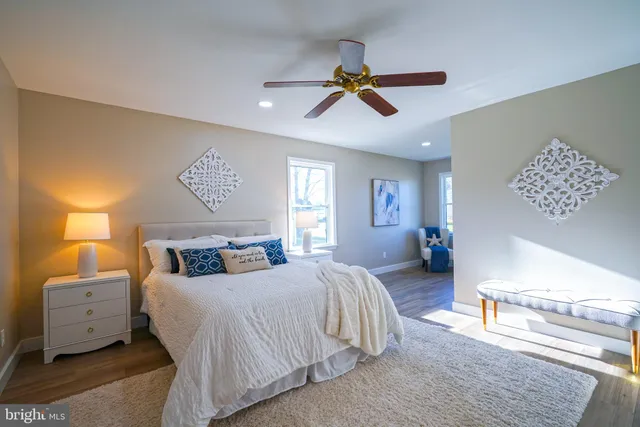 a bathroom with a tub and a window