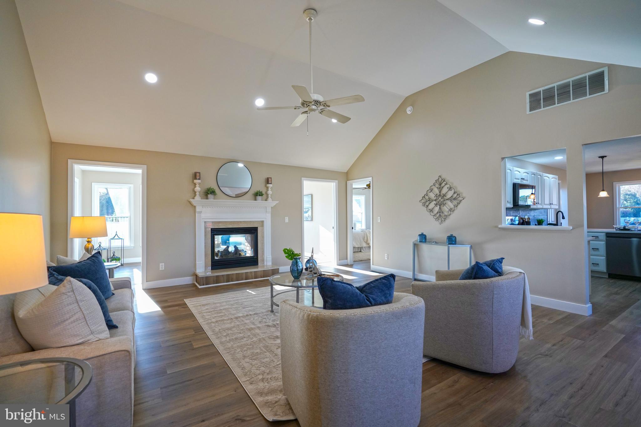 32911 Nassau Loop Lewes, DE 19958 - Photo 4 of 56 a living room with furniture and a fireplace