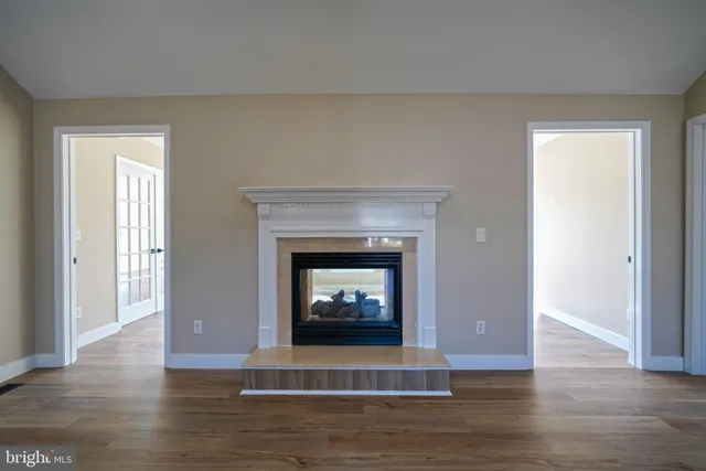 a living room with a fireplace