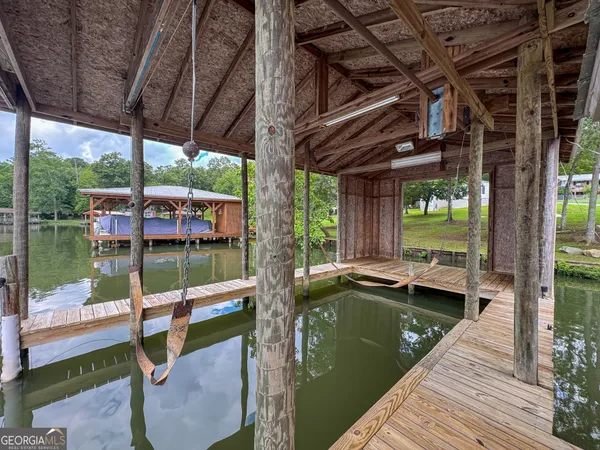 a view of swimming pool with a patio