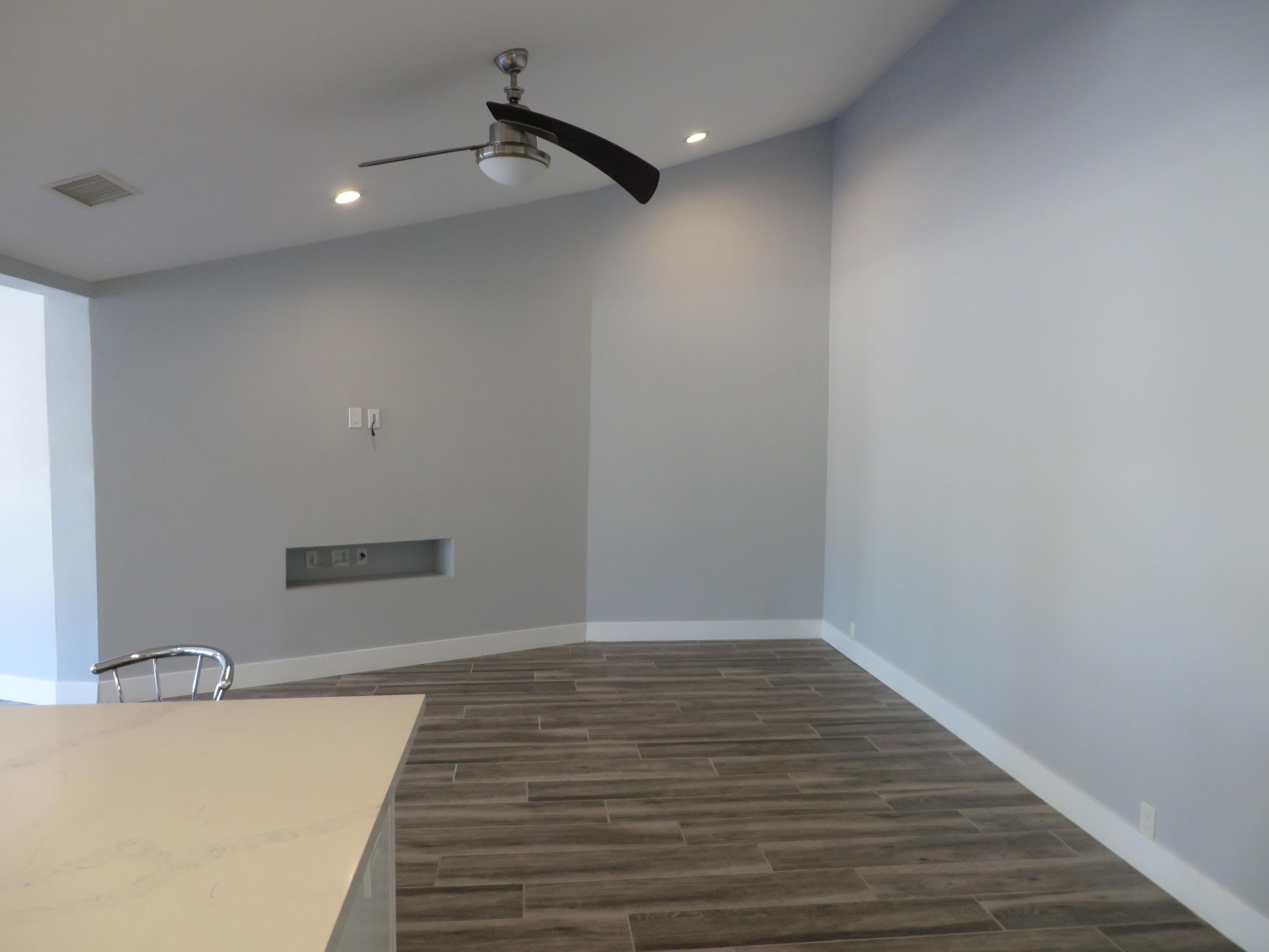 73315 Haystack Road Palm Desert, CA 92260 - Photo 14 of 32 a view of an empty room with wooden floor