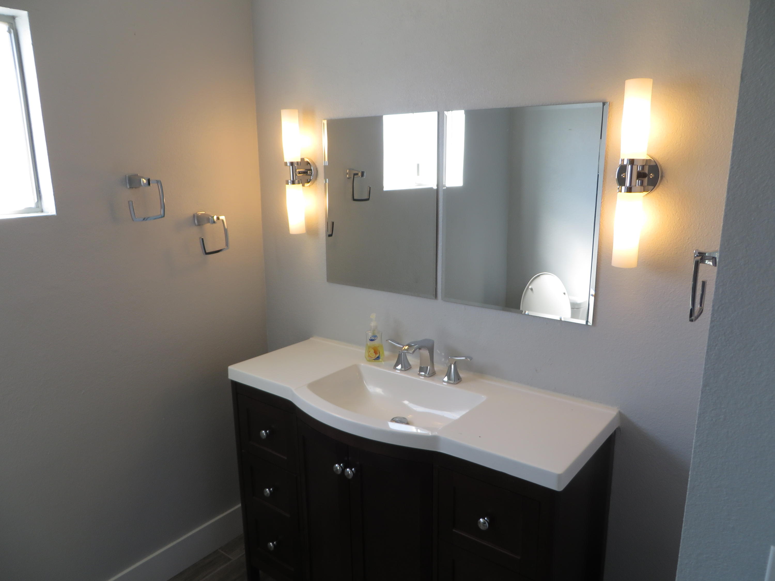 73315 Haystack Road Palm Desert, CA 92260 - Photo 17 of 32 a bathroom with a sink and a mirror