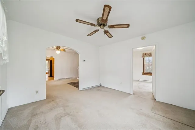 a view of a livingroom with a ceiling fan
