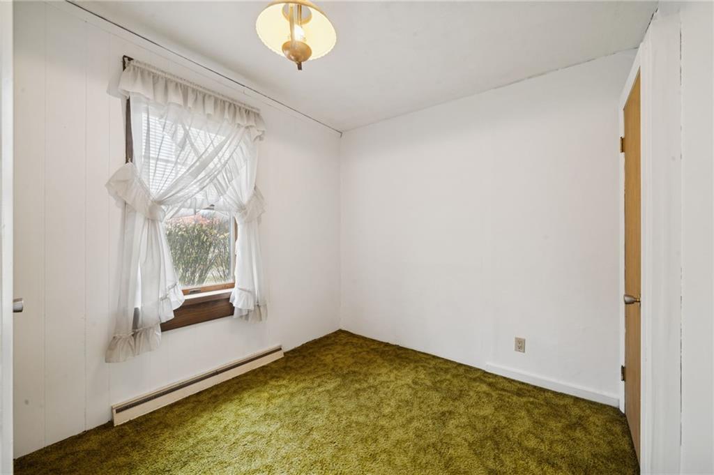 1619 Kennedy Road Imperial, PA 15126 - Photo 21 of 40 a view of an empty room with a window