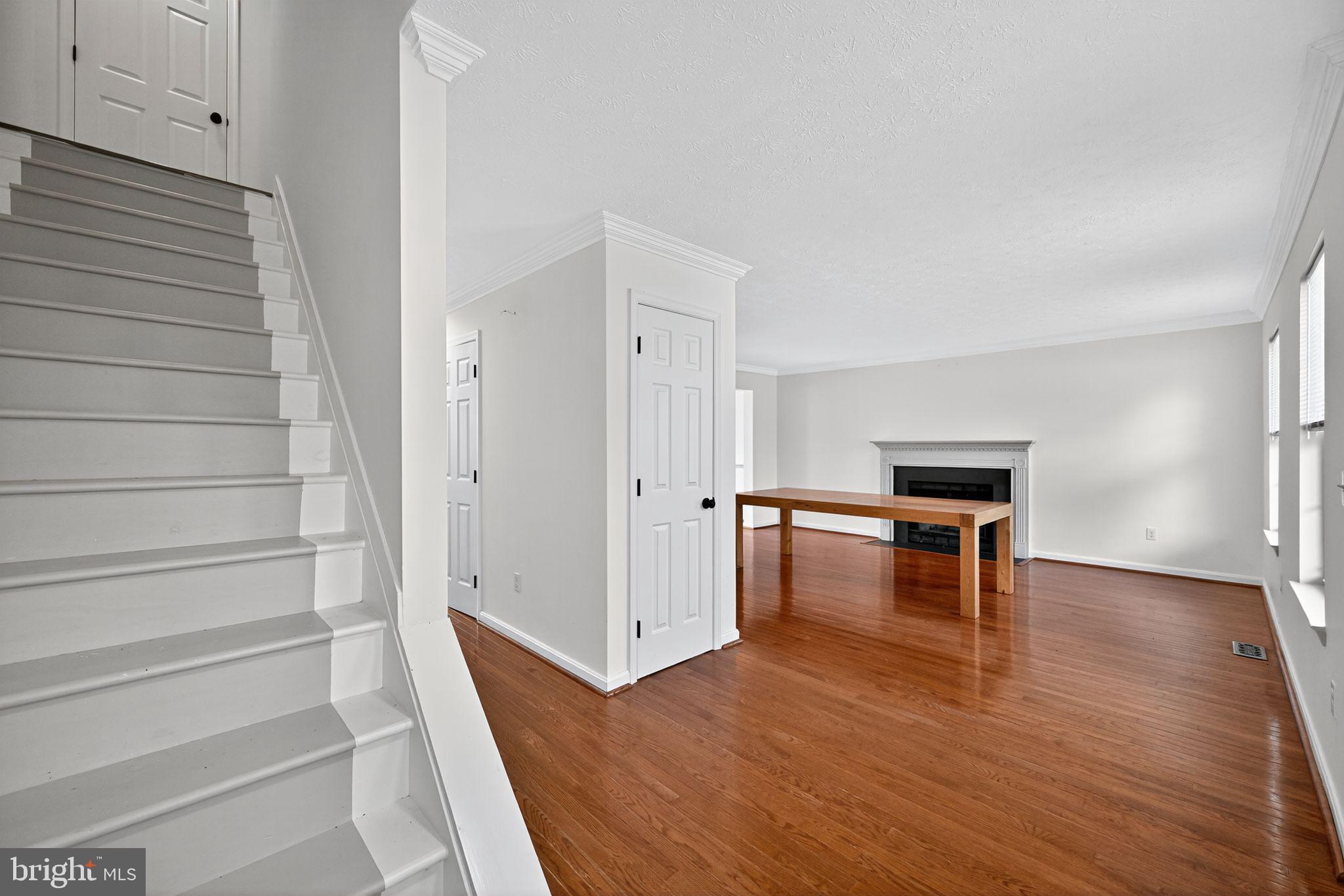 231 Cool Spring Lane Stewartstown, PA 17363 - Photo 11 of 27 a view of entryway with stairs and wooden floor