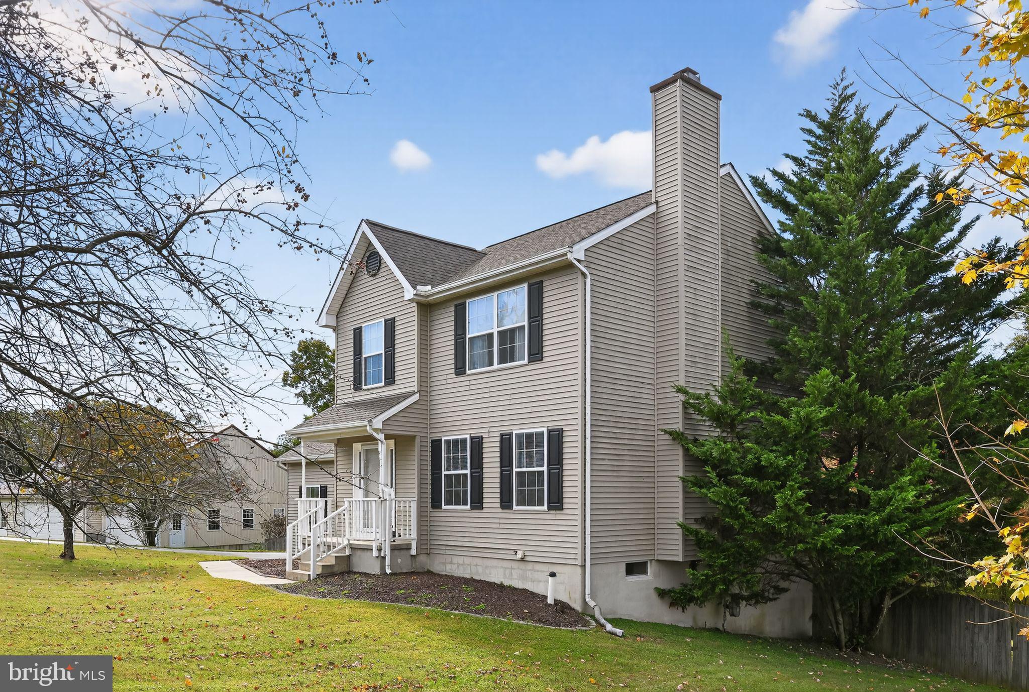 231 Cool Spring Lane Stewartstown, PA 17363 - Photo 3 of 27 a front view of a house with a yard and swimming pool