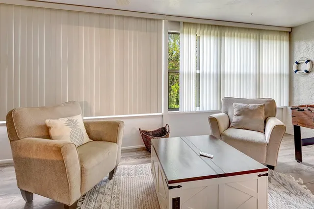 a kitchen with a stove and a refrigerator