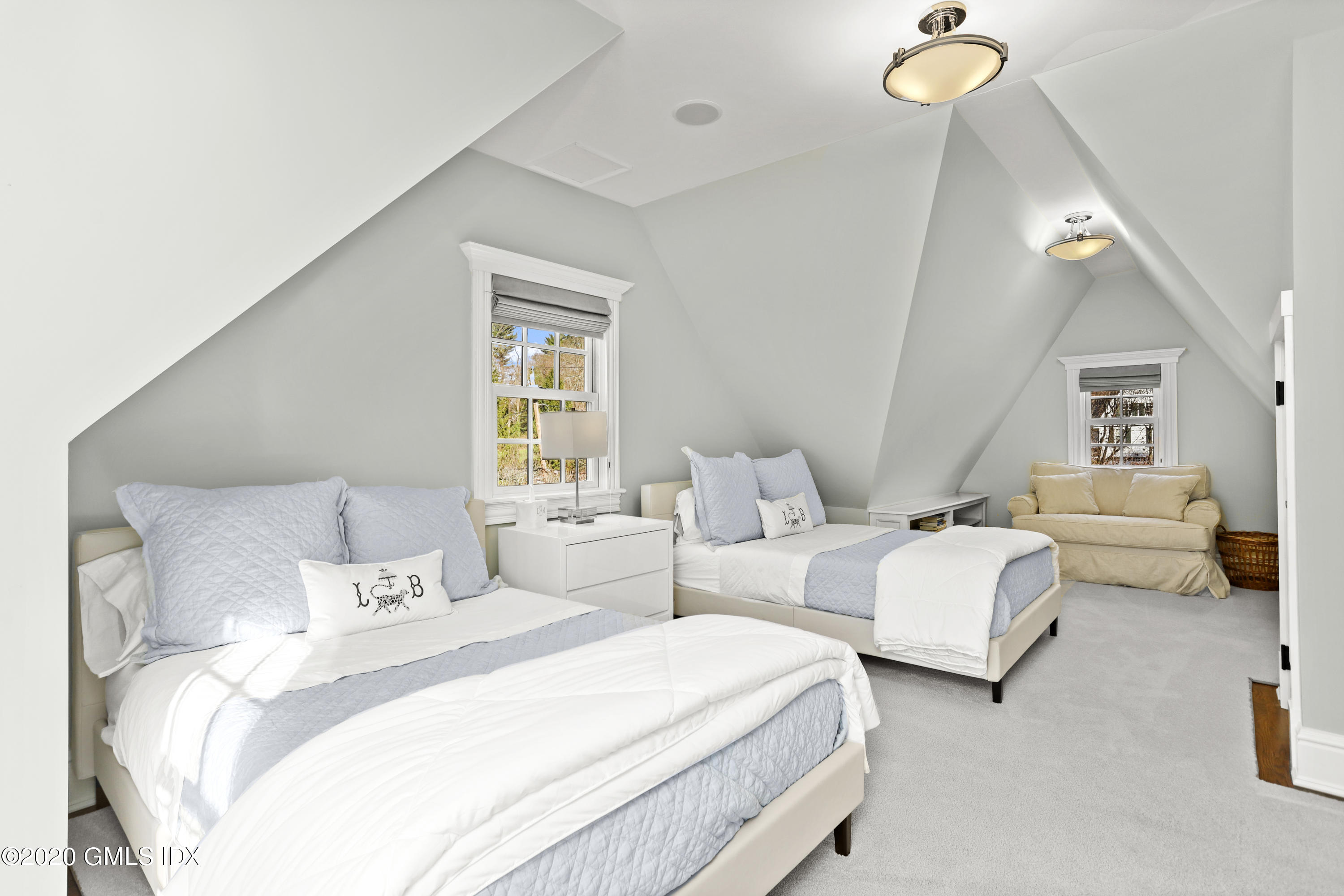 10 Brookridge Drive Greenwich, CT 06830 - Photo 19 of 36 a bedroom with bed and a couch