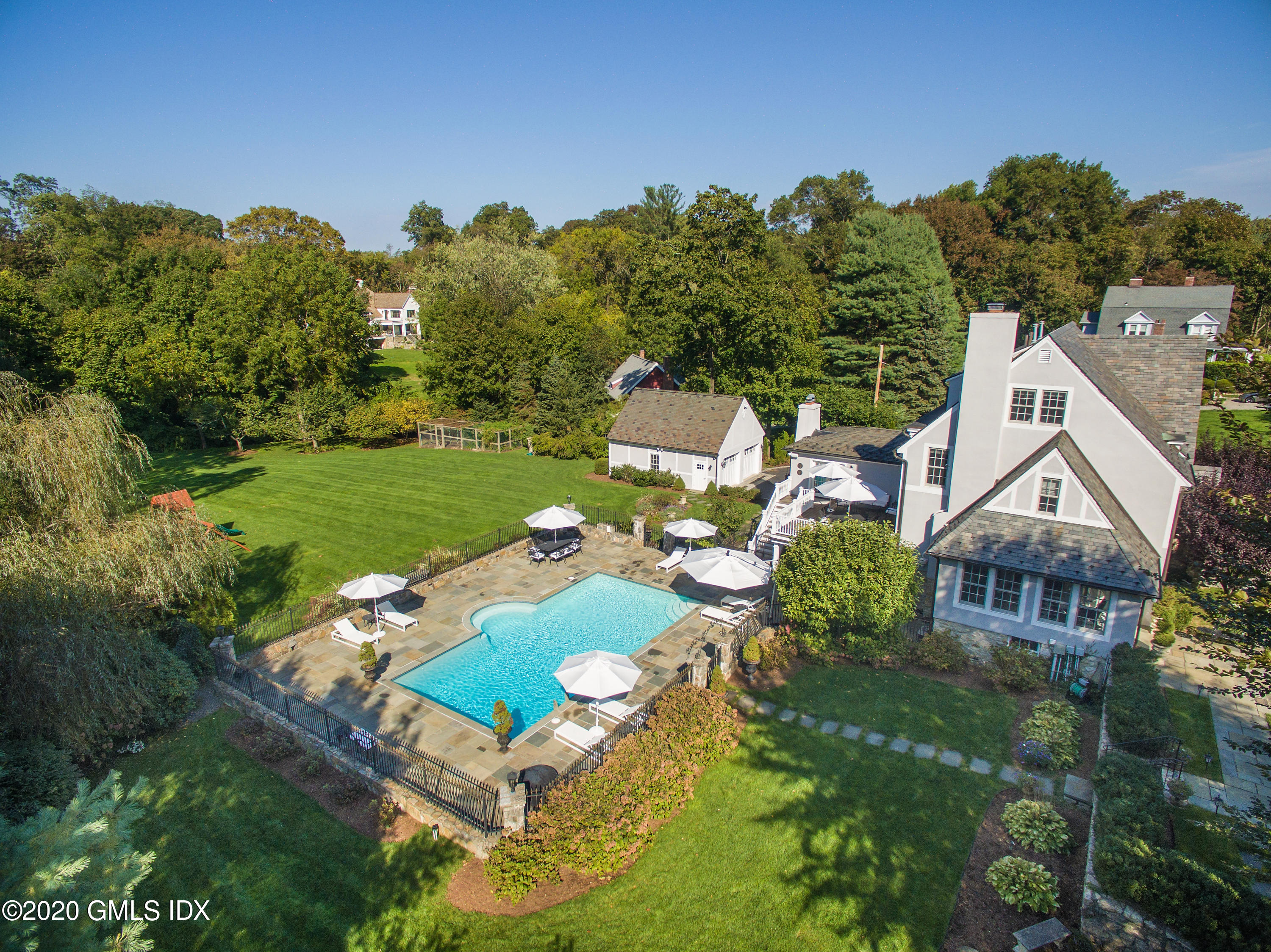 10 Brookridge Drive Greenwich, CT 06830 - Photo 2 of 36 an aerial view of a house with garden space houses and lake view