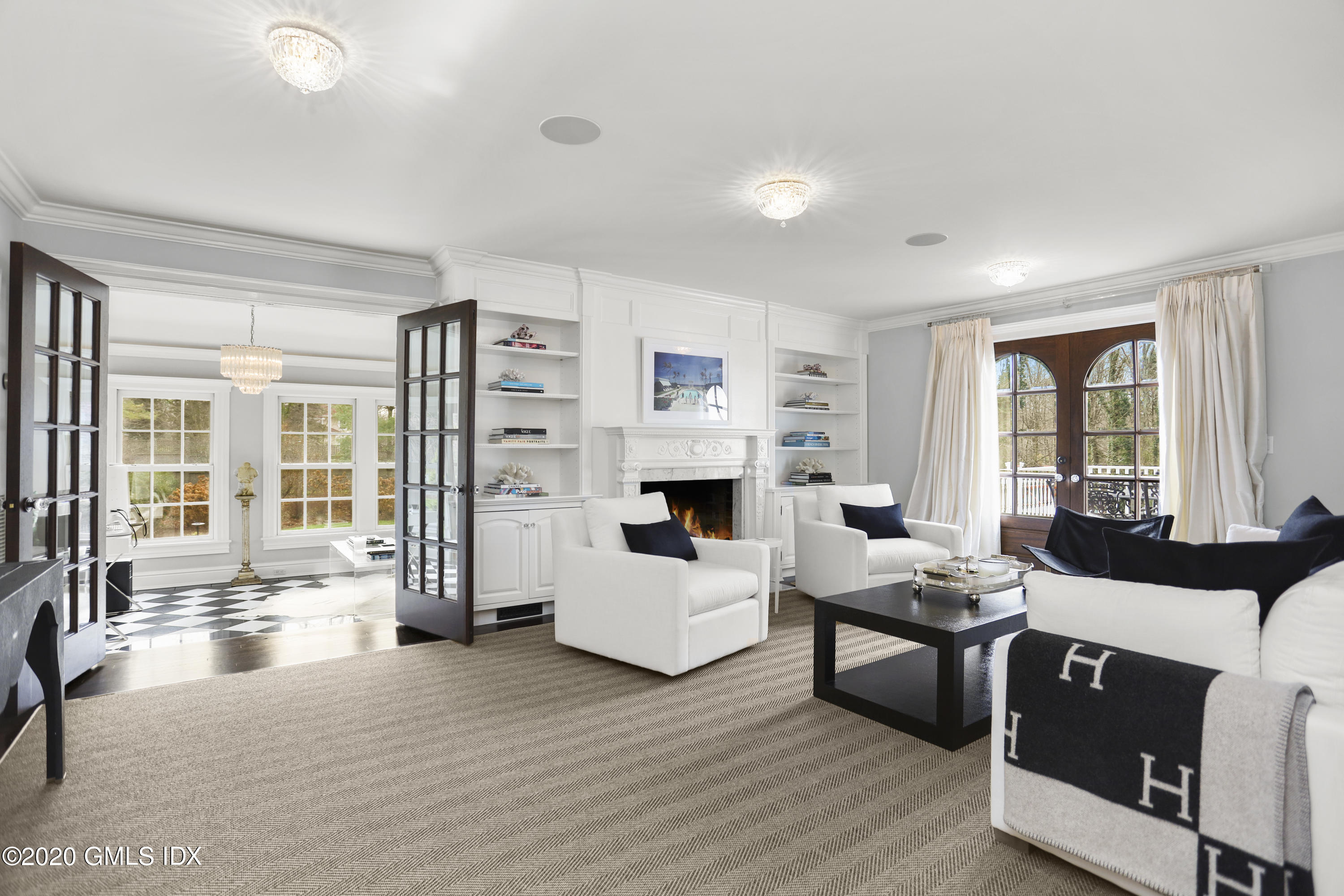 10 Brookridge Drive Greenwich, CT 06830 - Photo 4 of 36 a living room with furniture and fireplace