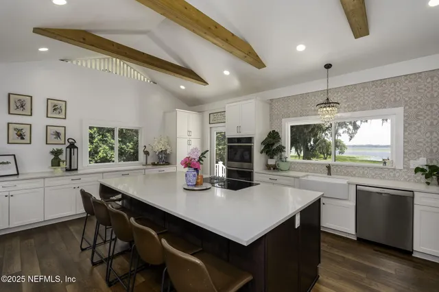 a bedroom with a bed and a night stand