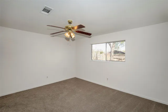 a stove top oven sitting inside of a kitchen
